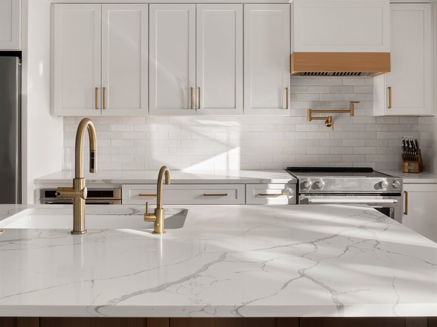 Custom white kitchen cabinets with island by Blue Mountain Design Bend Oregon