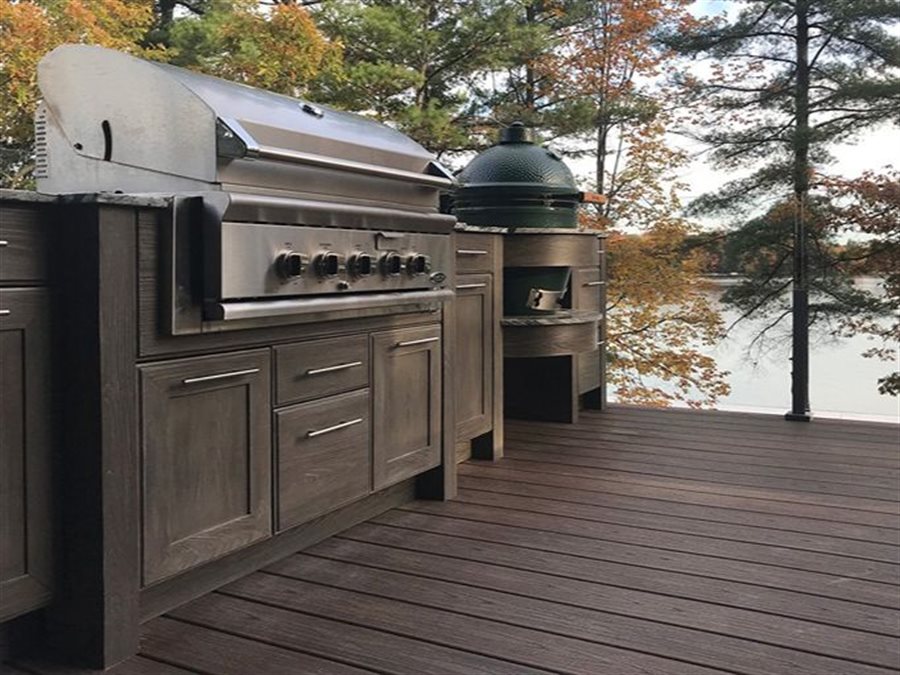 Weatherproof outdoor kitchen grill cabinets at a lakeside cottage by Blue Mountain Design Bend Oregon