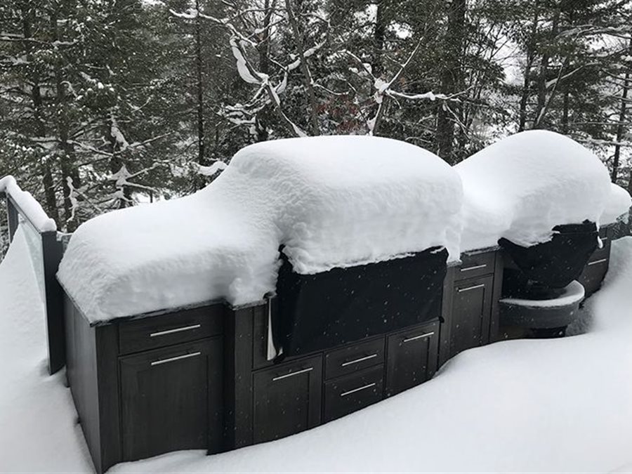 NatureKast weatherproof outdoor kitchen cabinetry buried in heavy snow by Blue Mountain Design Bend Oregon
